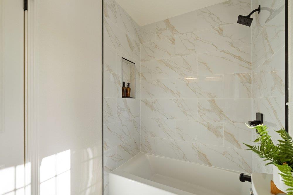10496 South Stelling Road Cupertino, CA 95014 - Photo 38 of 54 a bathroom with a bathtub