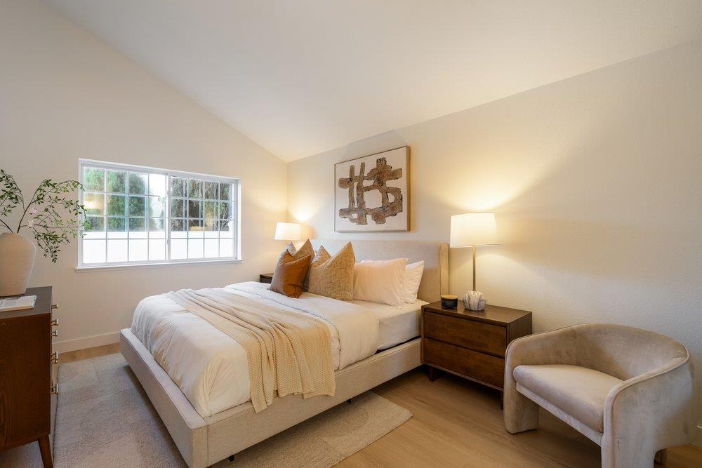 10496 South Stelling Road Cupertino, CA 95014 - Photo 39 of 54 a bedroom with a bed and a couch