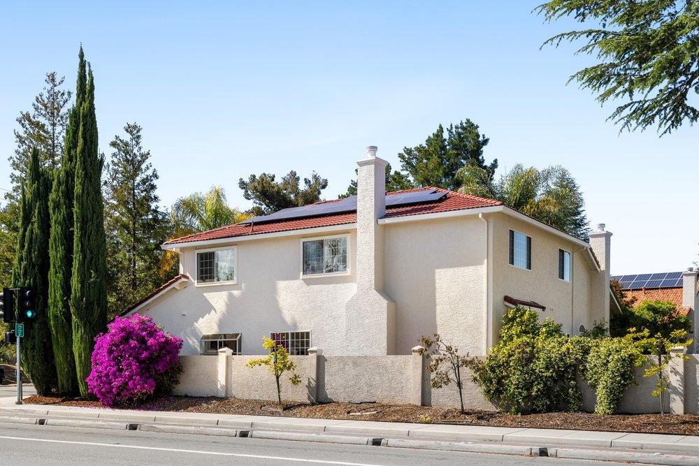 10496 South Stelling Road Cupertino, CA 95014 - Photo 49 of 54 a front view of house with yard and trees around