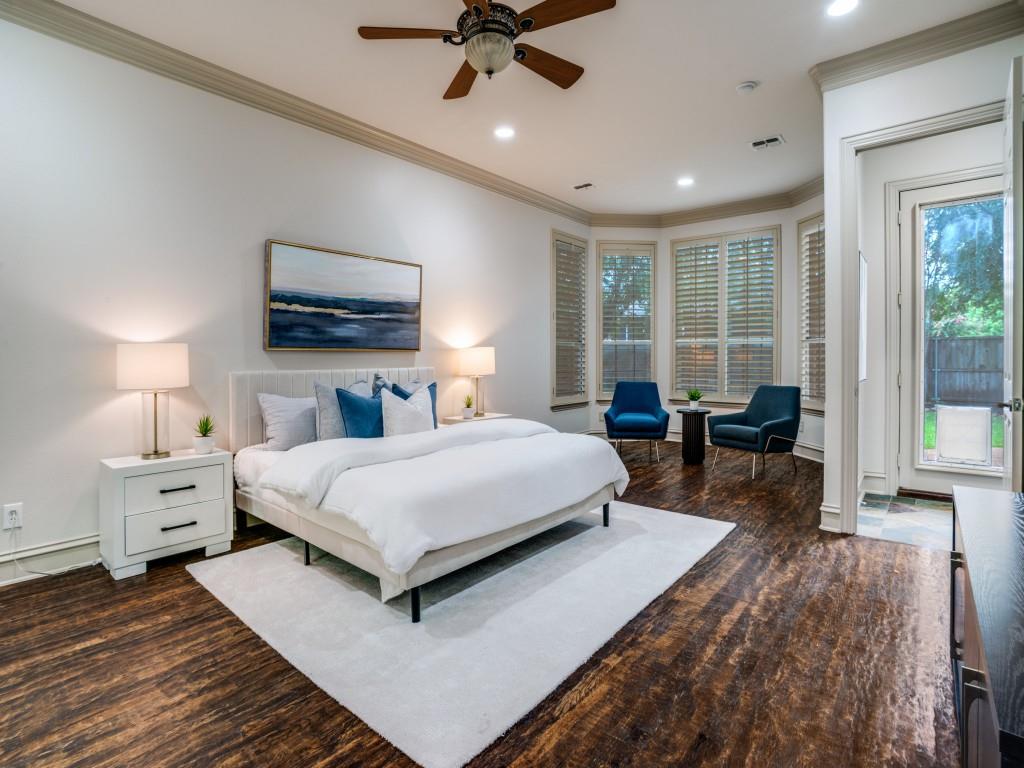 1908 Bordeaux Court Allen, TX 75002 - Photo 15 of 28 a spacious bedroom with a bed a couch and large window