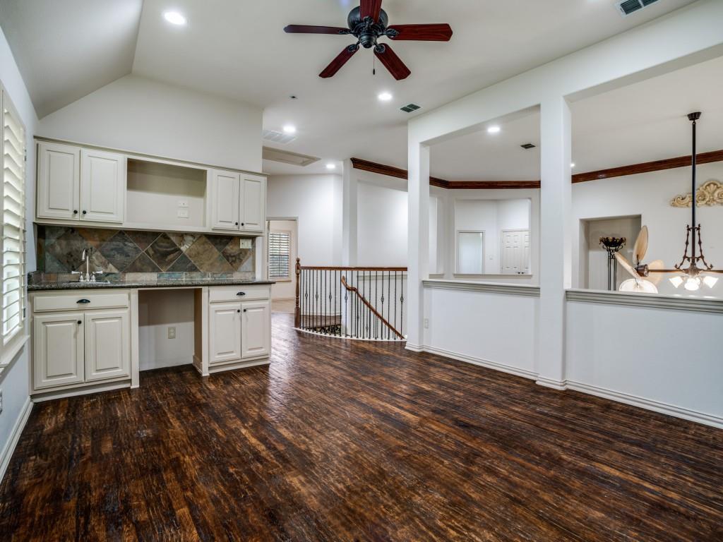 1908 Bordeaux Court Allen, TX 75002 - Photo 23 of 28 a kitchen with stainless steel appliances a refrigerator sink and cabinets