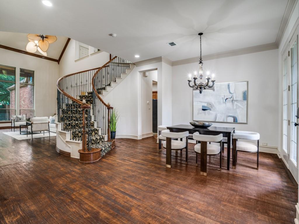 1908 Bordeaux Court Allen, TX 75002 - Photo 3 of 28 a view of a dining room with furniture and wooden floor