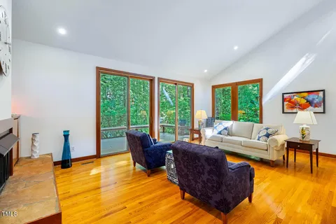 a white bath tub sitting in front of a window