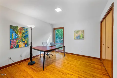 a bathroom with a double vanity sink a mirror and shower
