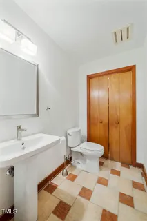 a view of a park with large trees