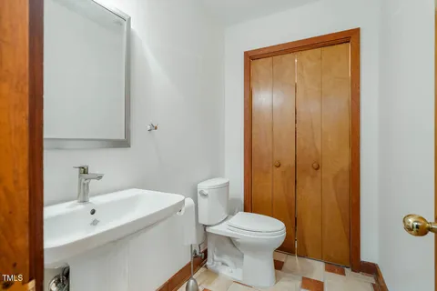 a view of a backyard with a large tree