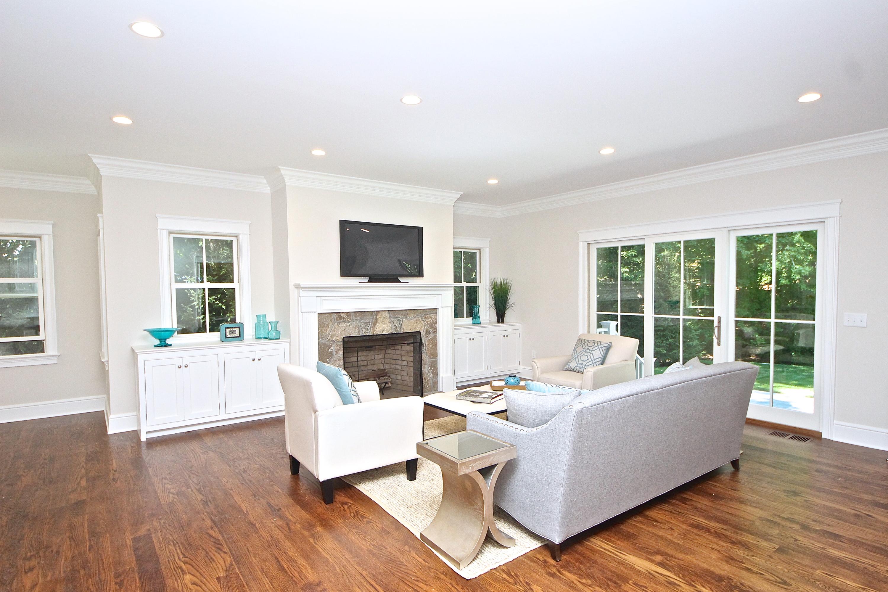 38 Old Parish Road Darien, CT 06820 - Photo 11 of 31 a living room with furniture and a fireplace