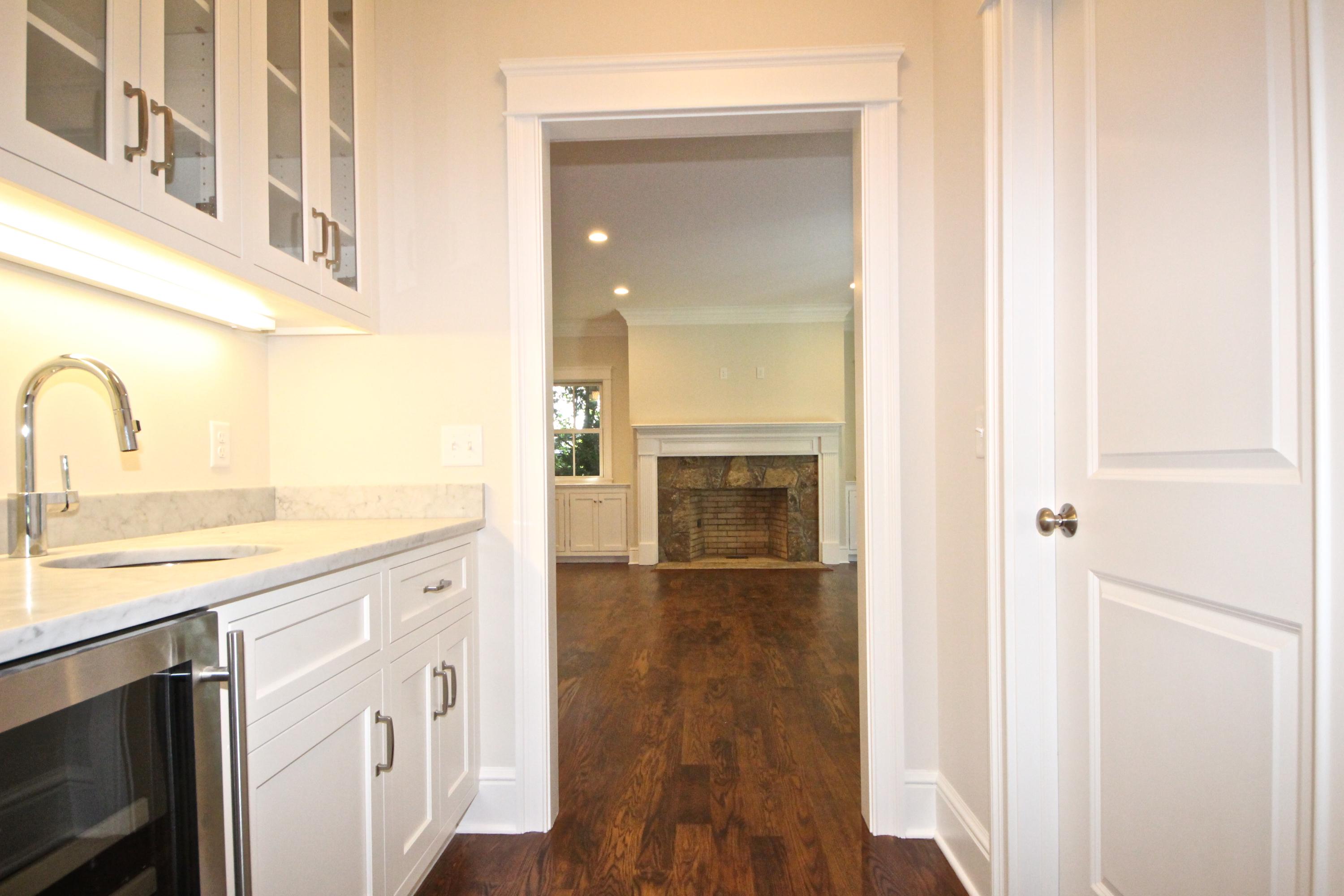 38 Old Parish Road Darien, CT 06820 - Photo 13 of 31 a view of a kitchen with a sink and a stove top oven