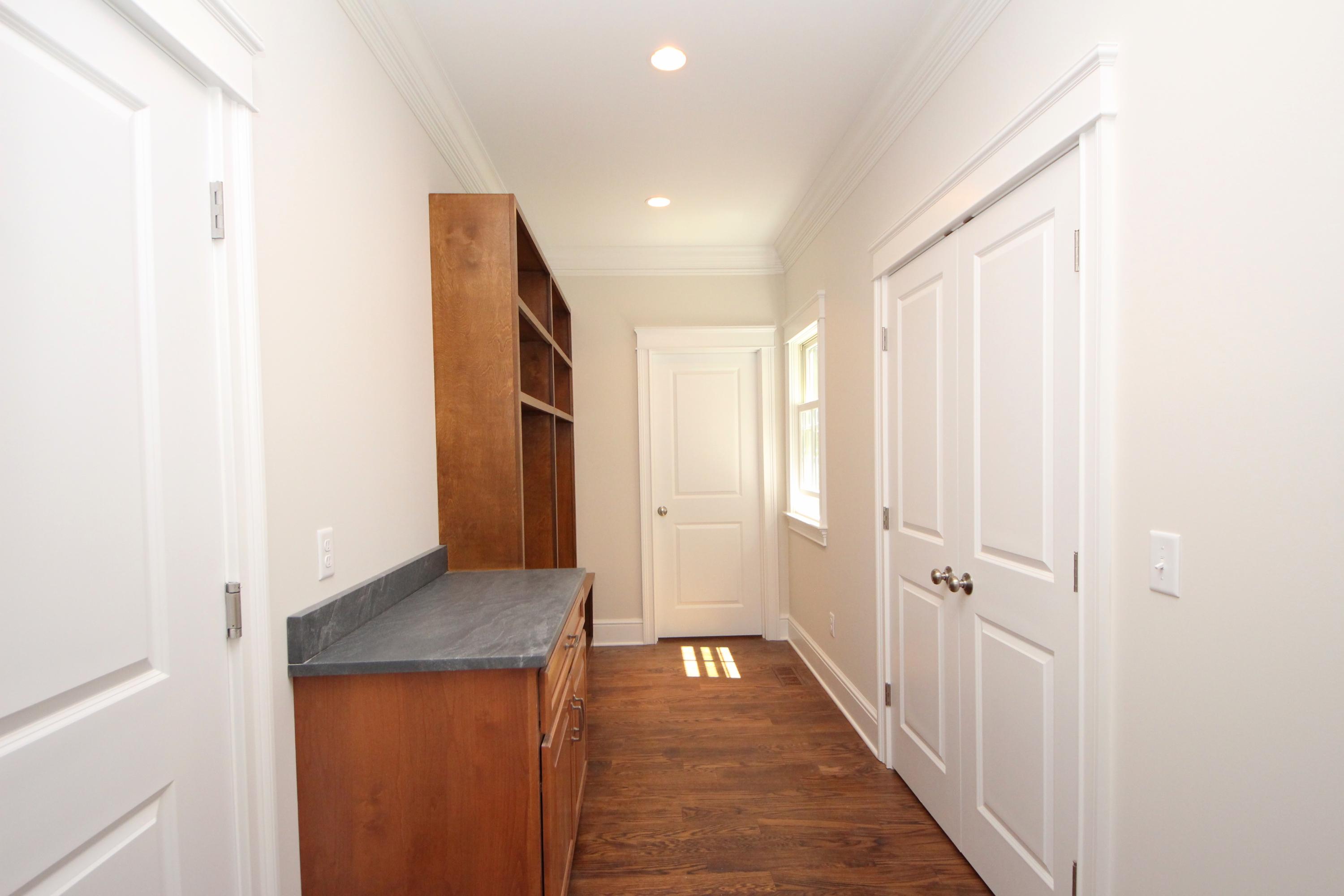 38 Old Parish Road Darien, CT 06820 - Photo 15 of 31 a view of a hallway with wooden floor
