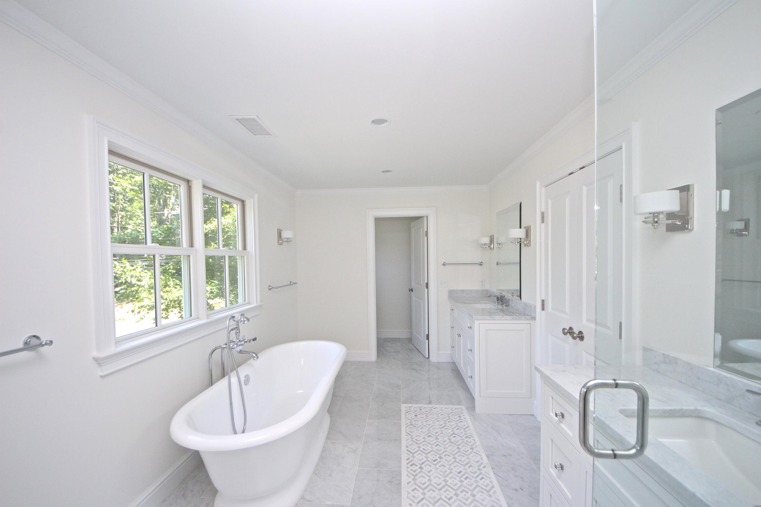 38 Old Parish Road Darien, CT 06820 - Photo 19 of 31 a bathroom with a bathtub and a sink