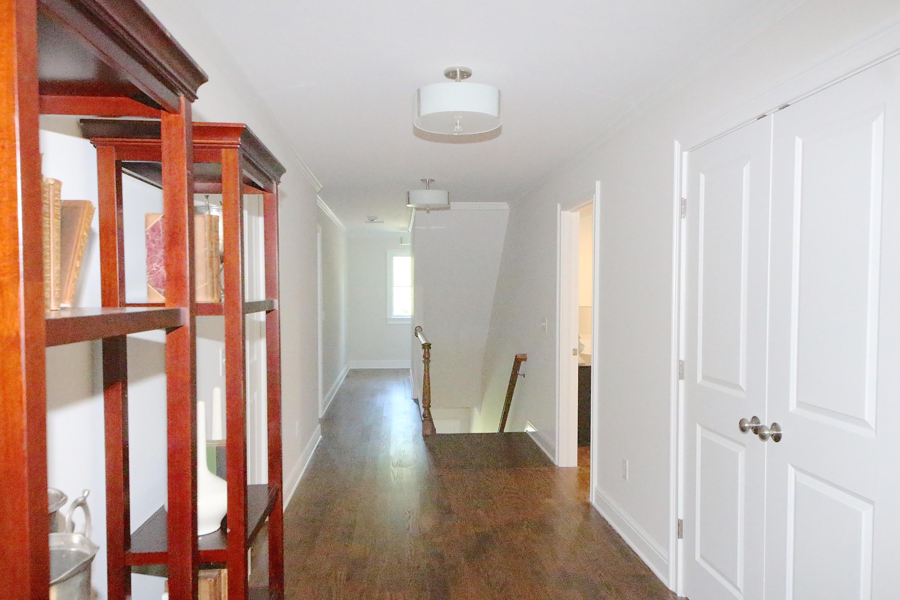 38 Old Parish Road Darien, CT 06820 - Photo 20 of 31 a view of entryway with stairs and wooden floor