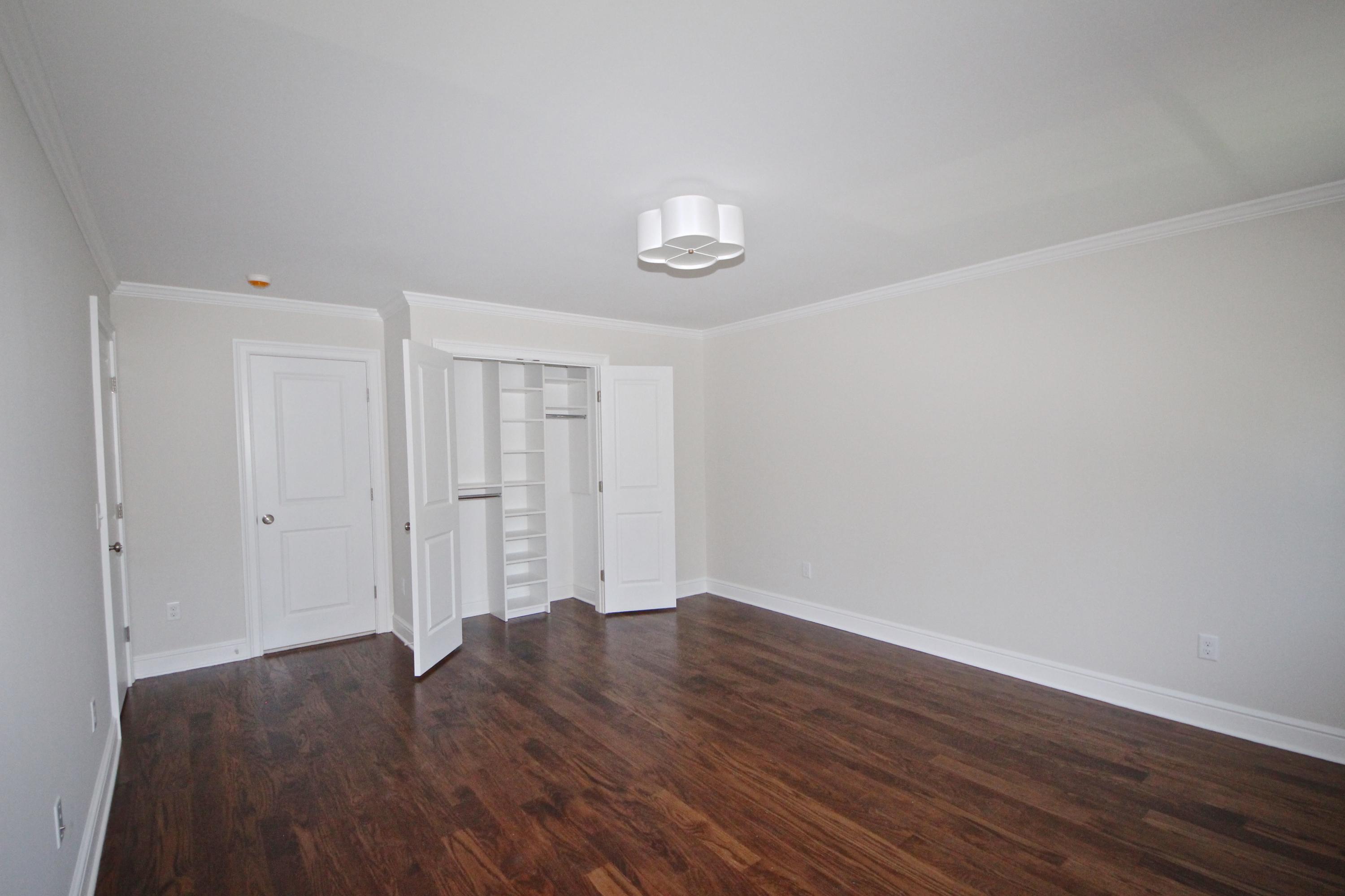 38 Old Parish Road Darien, CT 06820 - Photo 21 of 31 a big room with wooden floor and windows
