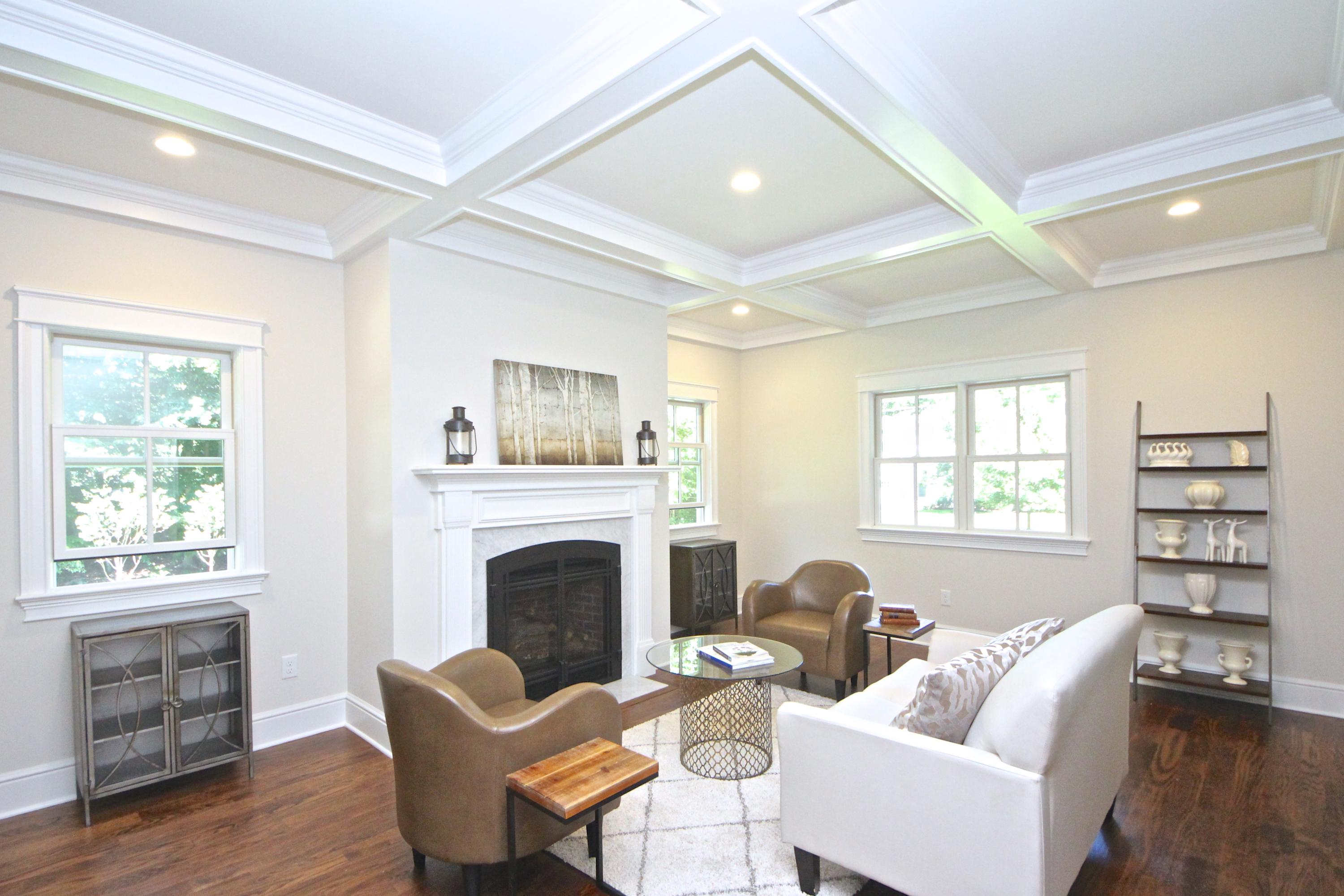 38 Old Parish Road Darien, CT 06820 - Photo 30 of 31 a living room with furniture a fireplace and a window