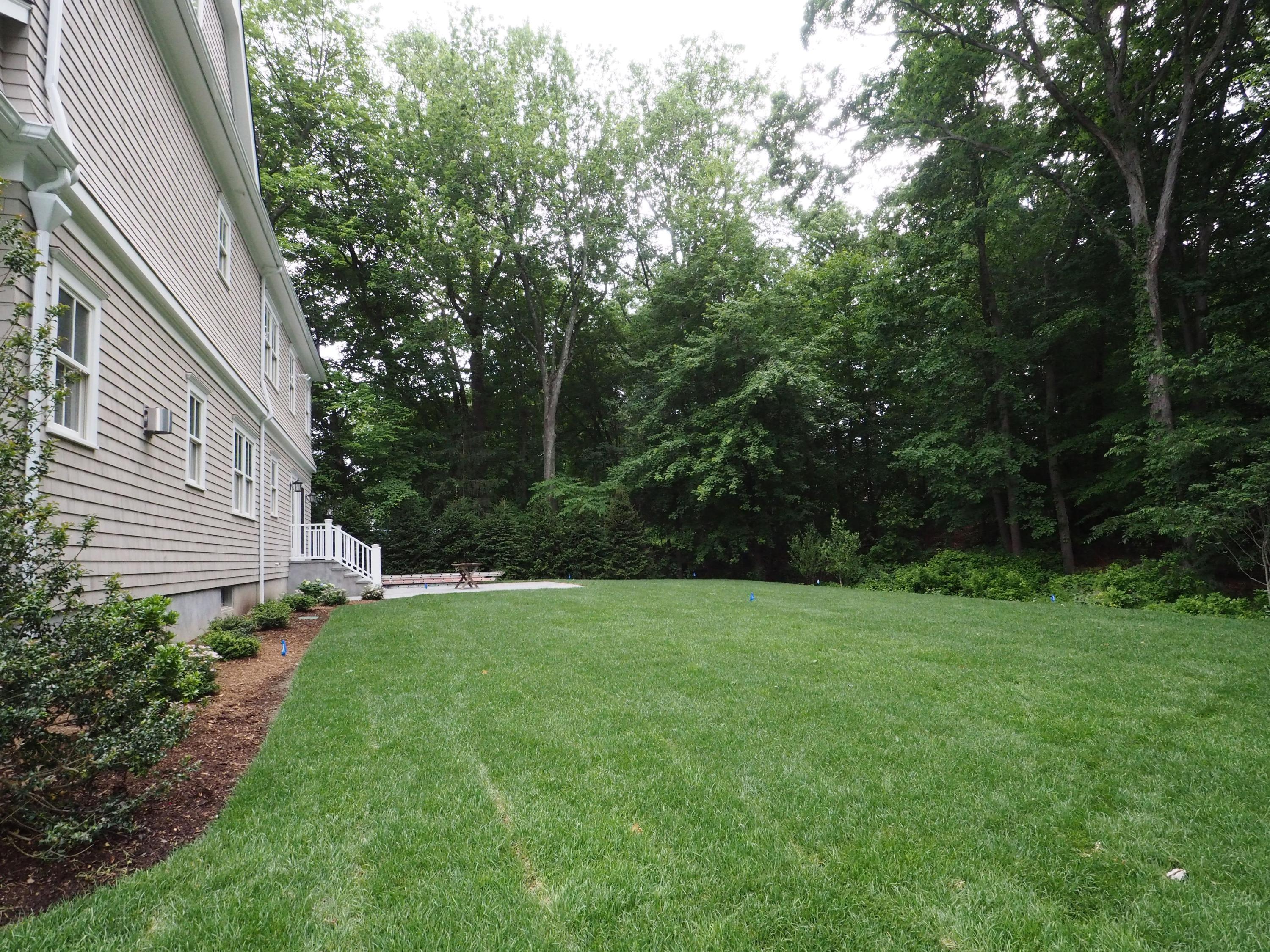 38 Old Parish Road Darien, CT 06820 - Photo 31 of 31 a view of a backyard with large trees