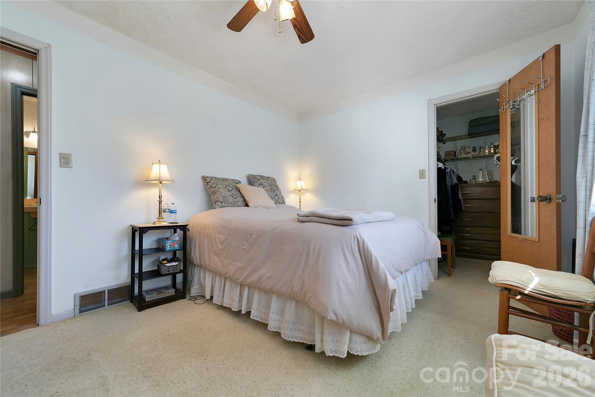 177 Walelu Court Brevard, NC 28712 - Photo 13 of 26 a bedroom with a bed and a chair in it