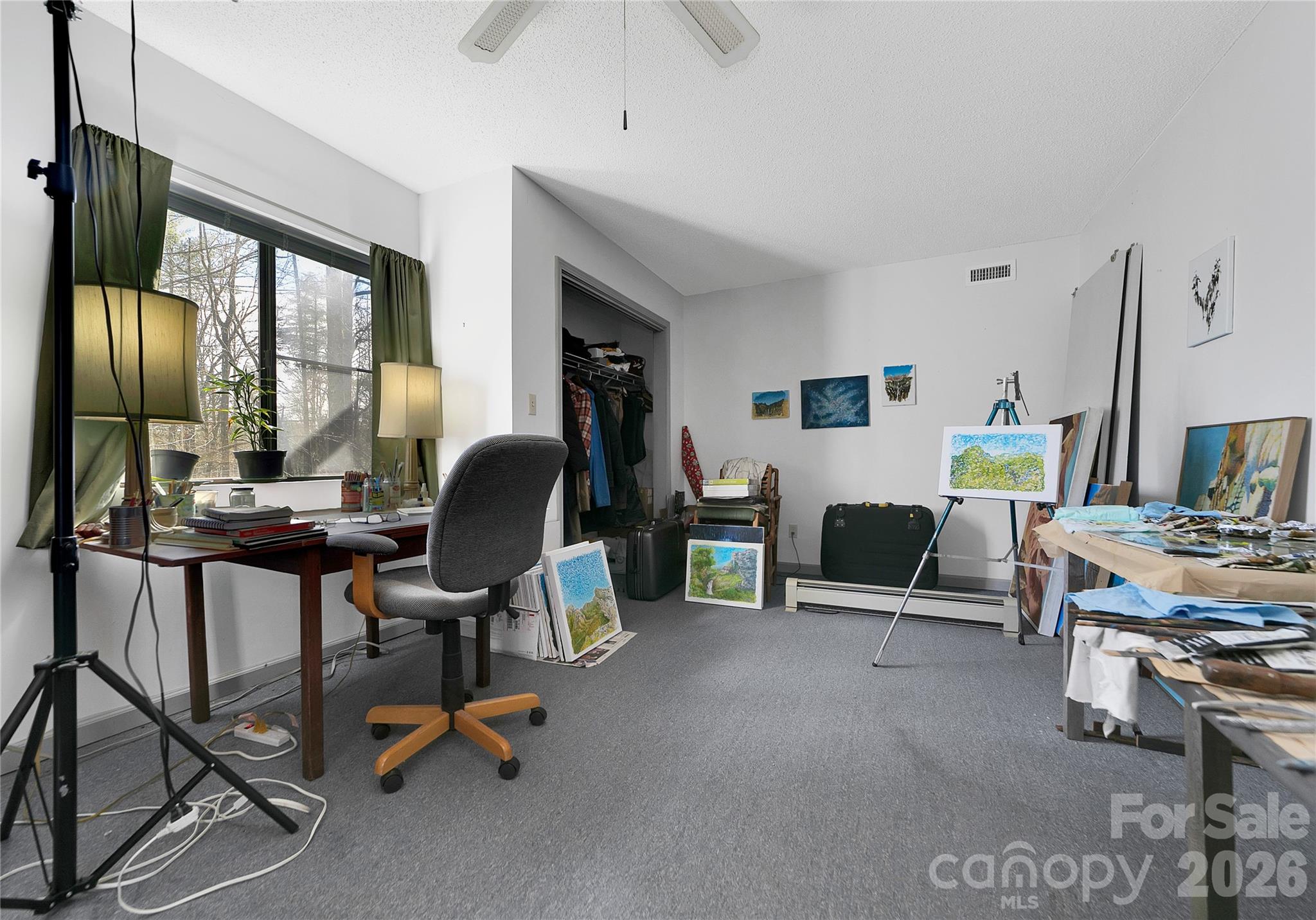 177 Walelu Court Brevard, NC 28712 - Photo 20 of 26 a view of a livingroom with workspace and a window