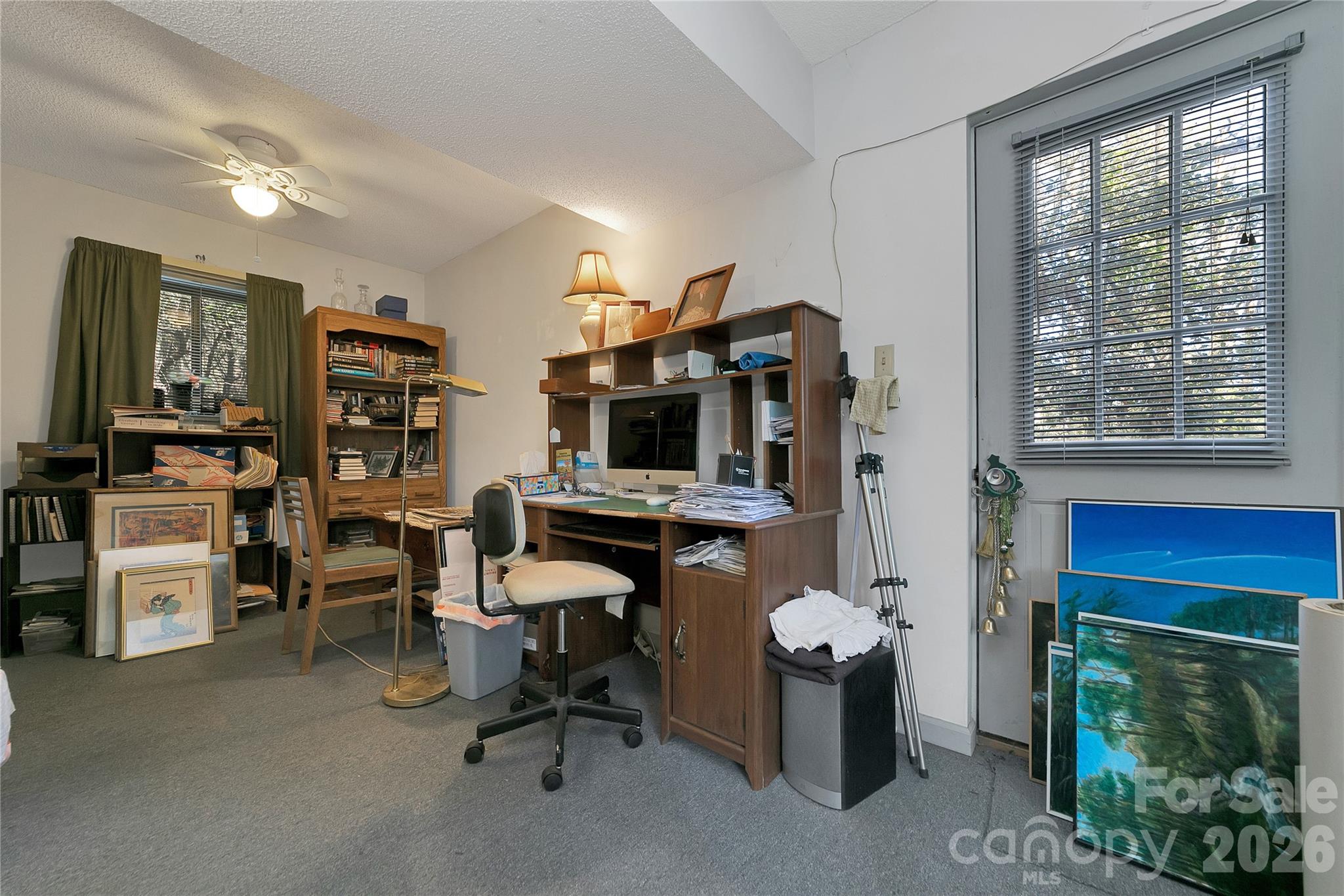 177 Walelu Court Brevard, NC 28712 - Photo 21 of 26 a view of a workspace with furniture and a fireplace