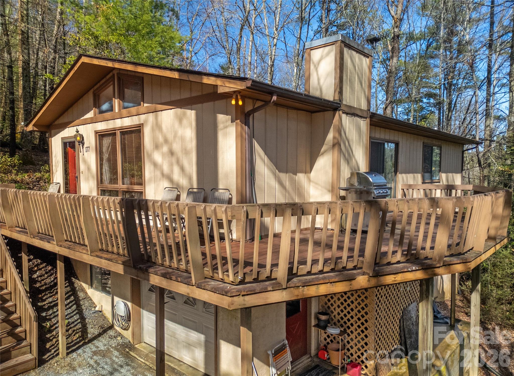 177 Walelu Court Brevard, NC 28712 - Photo 24 of 26 a view of house with a roof deck