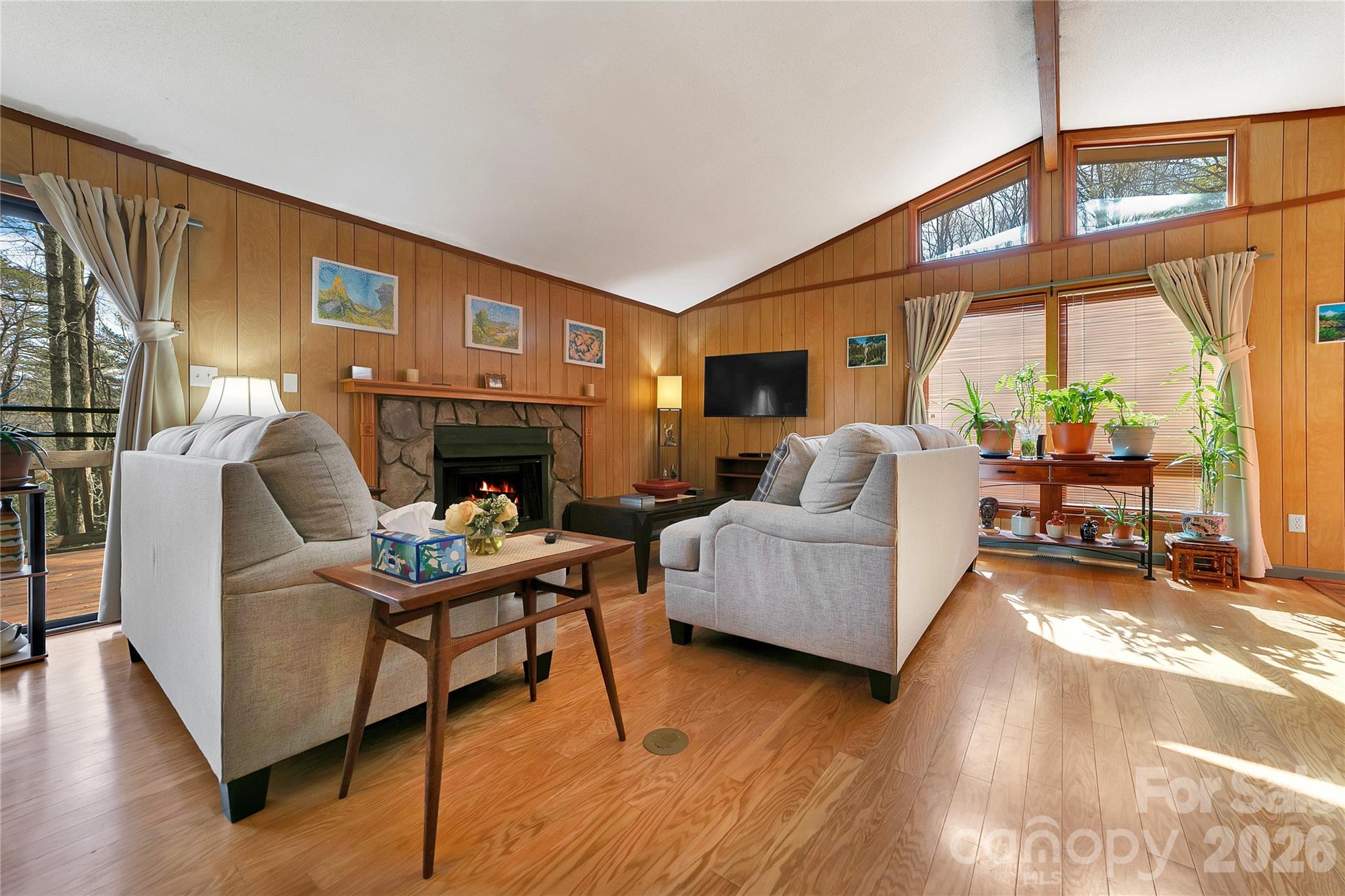 177 Walelu Court Brevard, NC 28712 - Photo 6 of 26 a living room with furniture and a fireplace