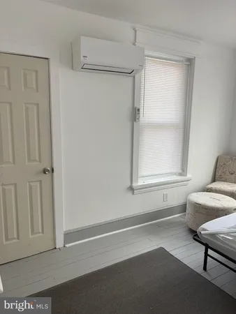 a view of livingroom with furniture and windows