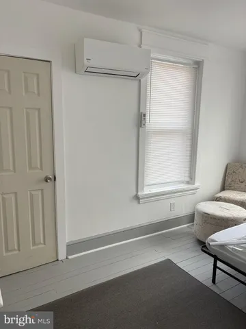 a view of livingroom with furniture and windows