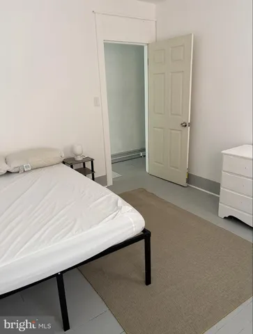 a room with a bed and a table