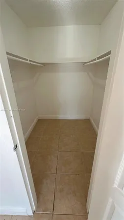 a view of backyard and garage