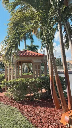 a view of a yard with a fountain