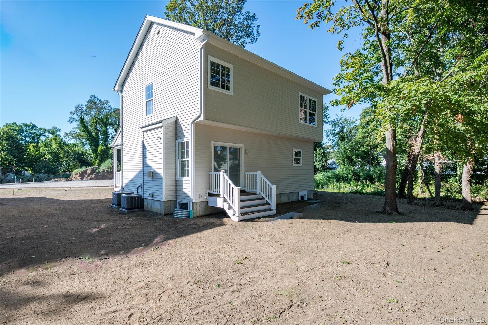 2 Gail-grace Court Copiague, NY 11726 - Photo 20 of 27 Rear view of house