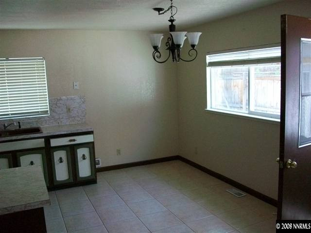 3430 Rauscher Drive Reno, NV 89503 - Photo 3 of 9 a view of empty room with windows