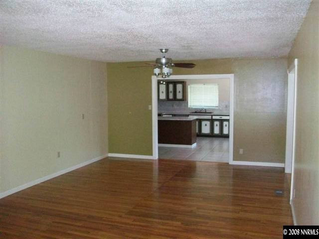 3430 Rauscher Drive Reno, NV 89503 - Photo 4 of 9 a view of kitchen and dining room with wooden floor
