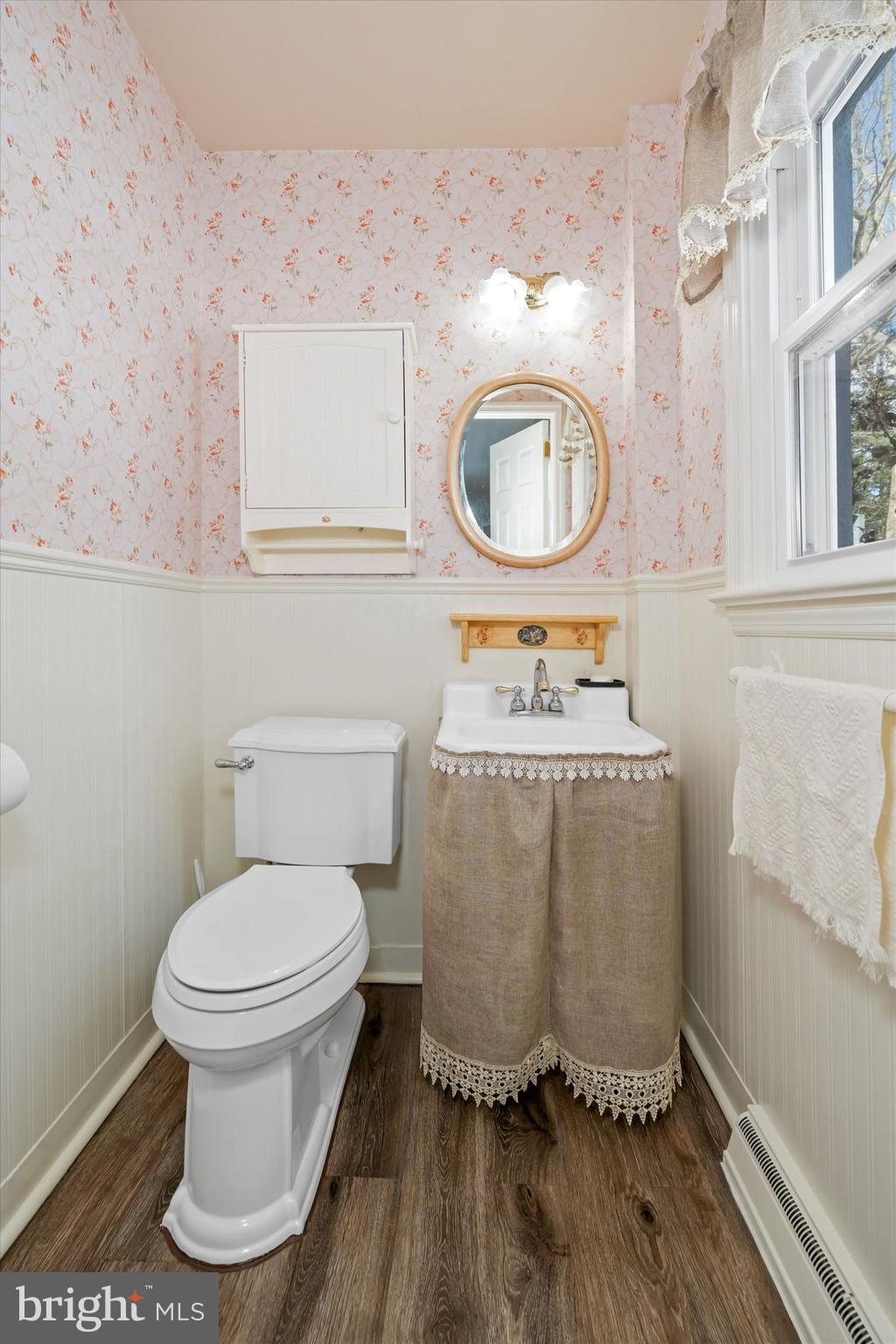 104 Danforth Place Wilmington, DE 19810 - Photo 27 of 53 a bathroom with a sink toilet and a mirror