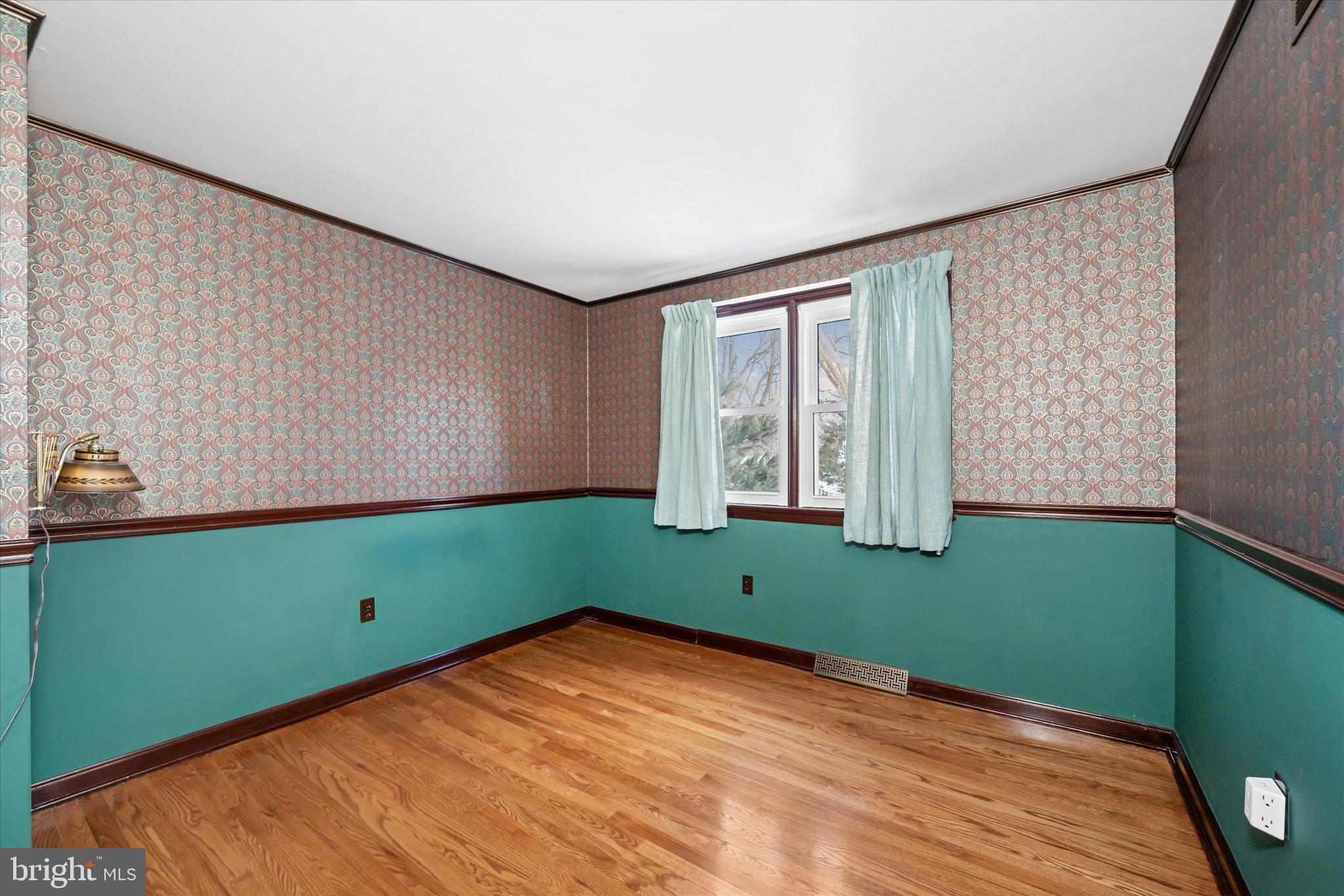 104 Danforth Place Wilmington, DE 19810 - Photo 41 of 53 a room with green walls and a window