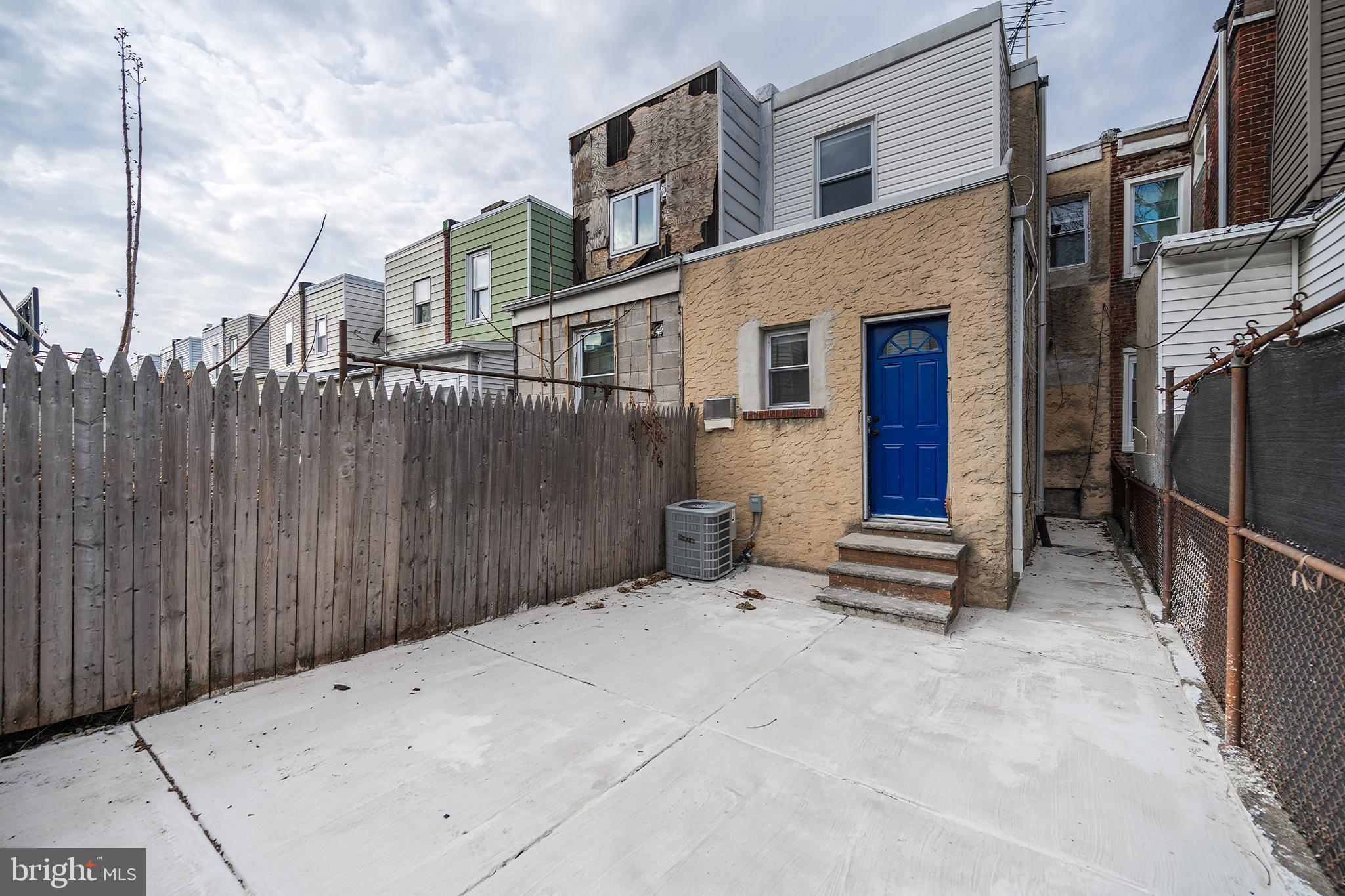 3097 Memphis Street Philadelphia, PA 19134 - Photo 12 of 26 a view of a house with a backyard