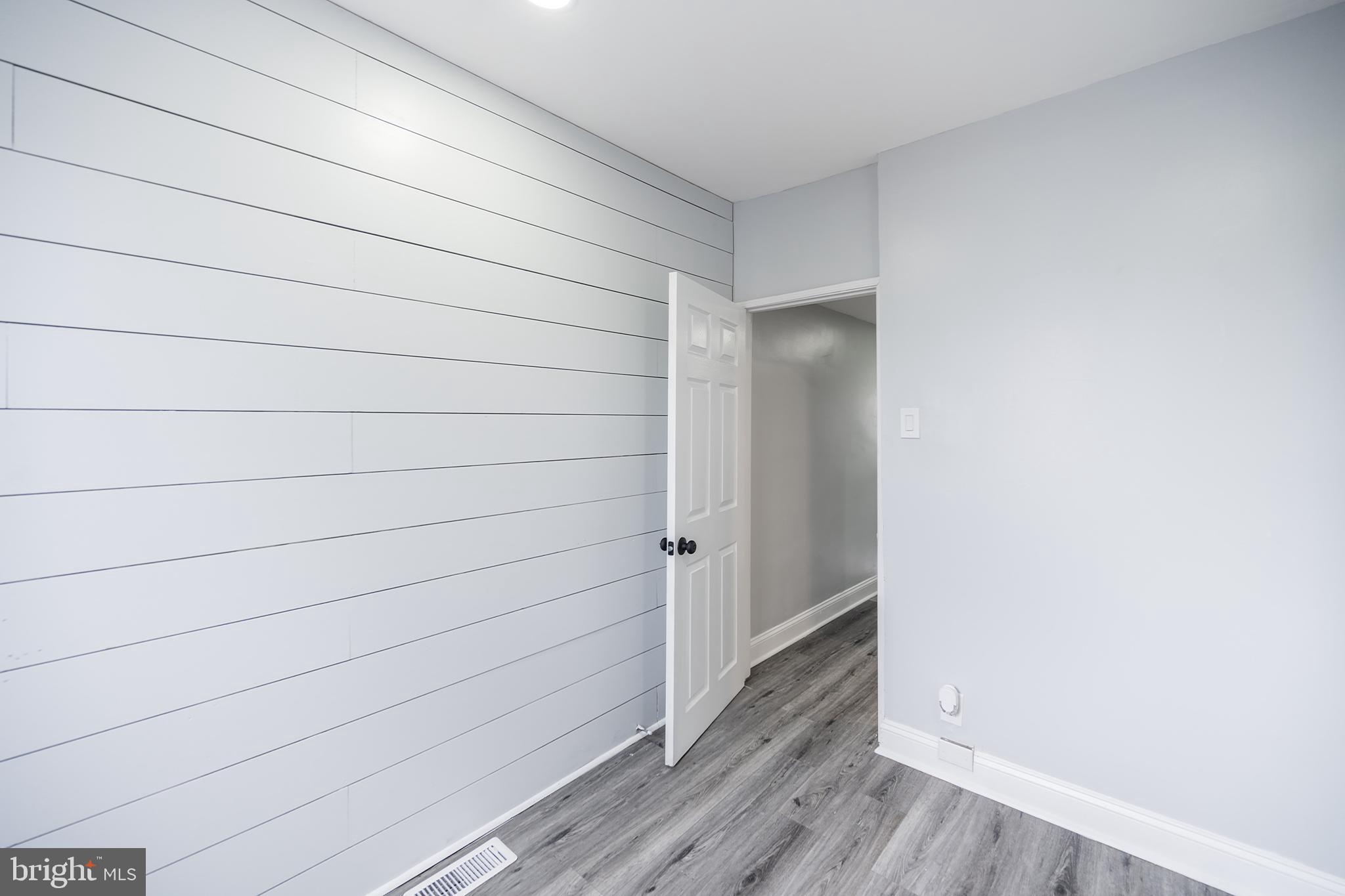 3097 Memphis Street Philadelphia, PA 19134 - Photo 15 of 26 a room with a bench