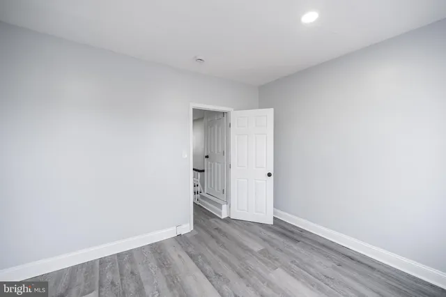 a view of a livingroom with wooden floor