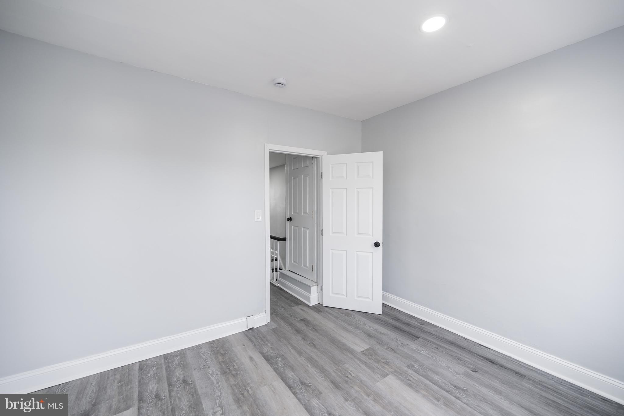3097 Memphis Street Philadelphia, PA 19134 - Photo 23 of 26 a view of an empty room with wooden floor