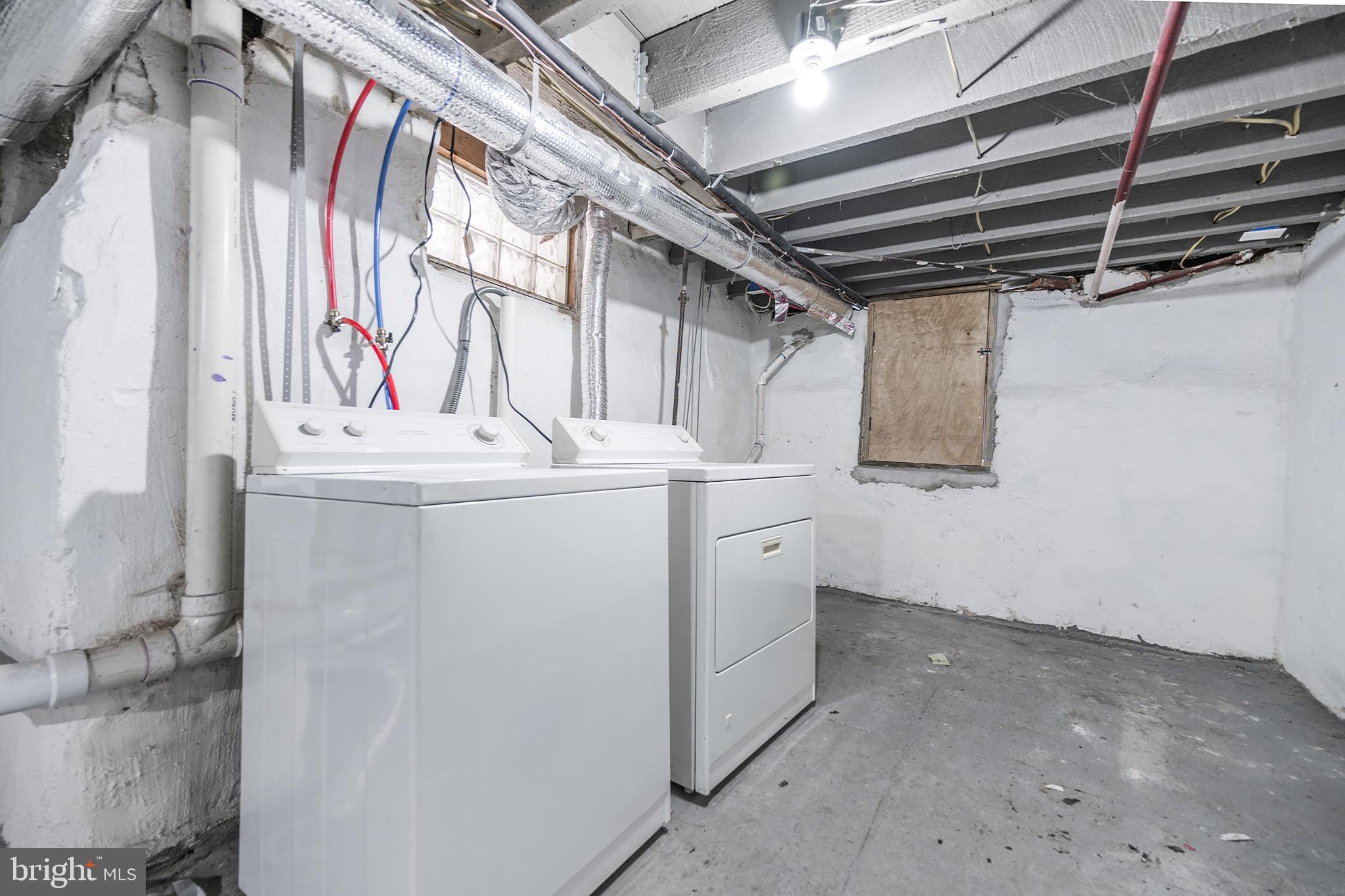 3097 Memphis Street Philadelphia, PA 19134 - Photo 25 of 26 a utility room with dryer and washer