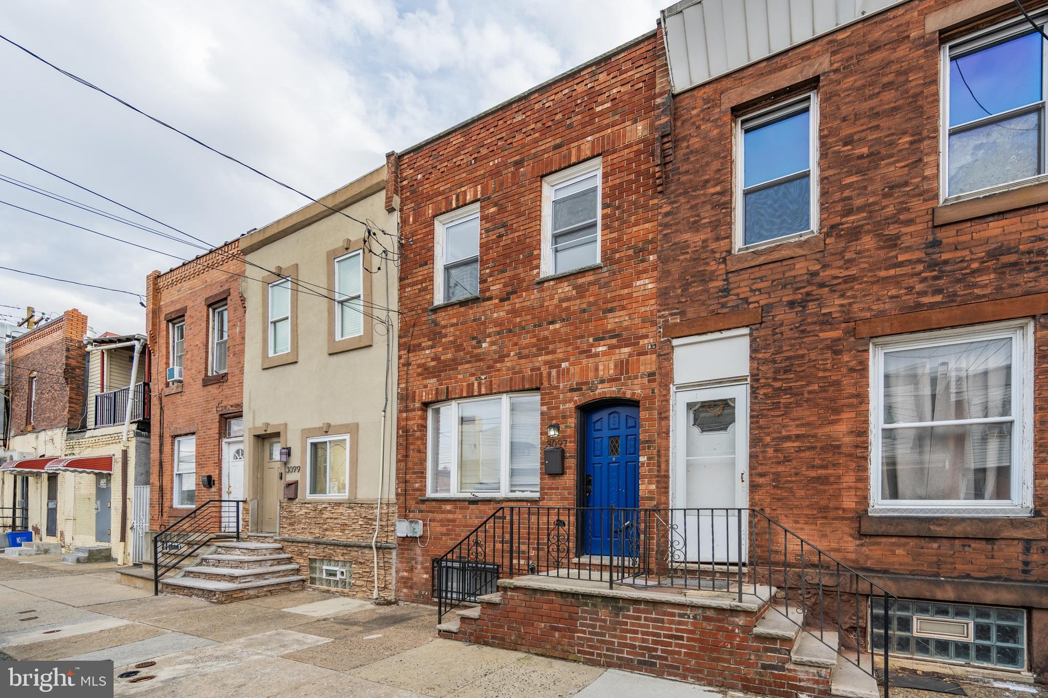 3097 Memphis Street Philadelphia, PA 19134 - Photo 26 of 26 a front view of a building with a street