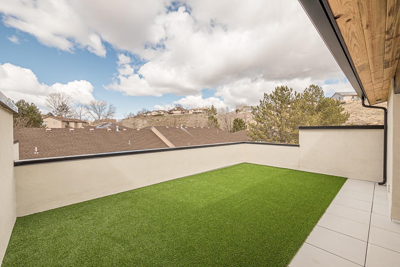 2394 Ridge Cir Drive, Unit B Grand Junction, CO 81507 - Photo 37 of 42 a view of a yard with an outdoor seating