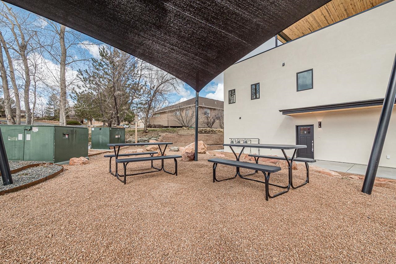 2394 Ridge Cir Drive, Unit B Grand Junction, CO 81507 - Photo 41 of 42 a view of chairs and tables in the roof deck