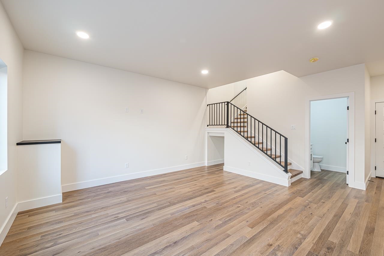 2394 Ridge Cir Drive, Unit B Grand Junction, CO 81507 - Photo 9 of 42 wooden floor in an empty room with wooden floor