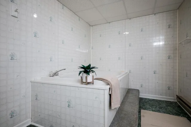 a bathroom with a sink a vanity and mirror