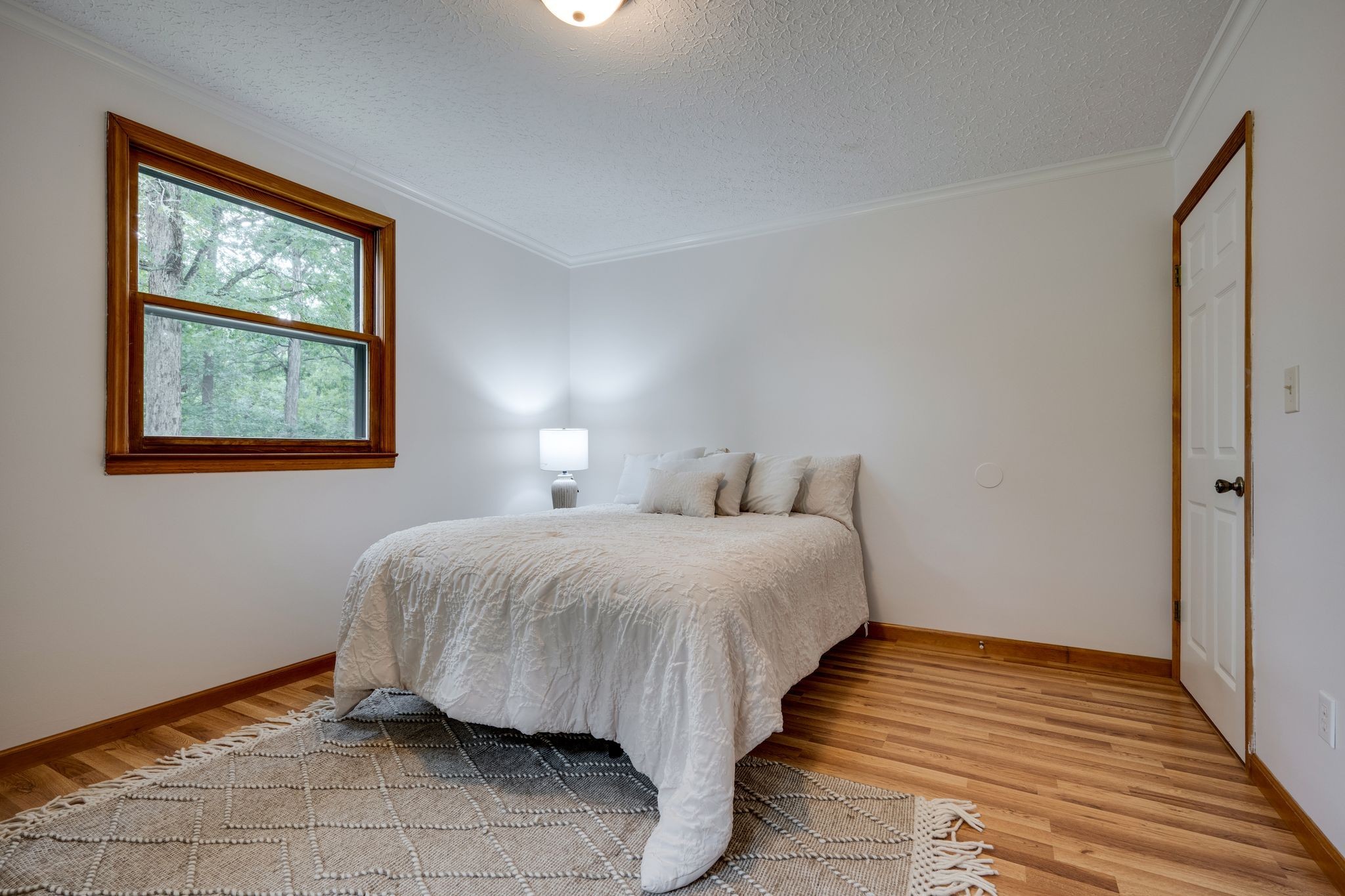 1085 Claylick Road White Bluff, TN 37187 - Photo 26 of 48 a bedroom with a bed and a window