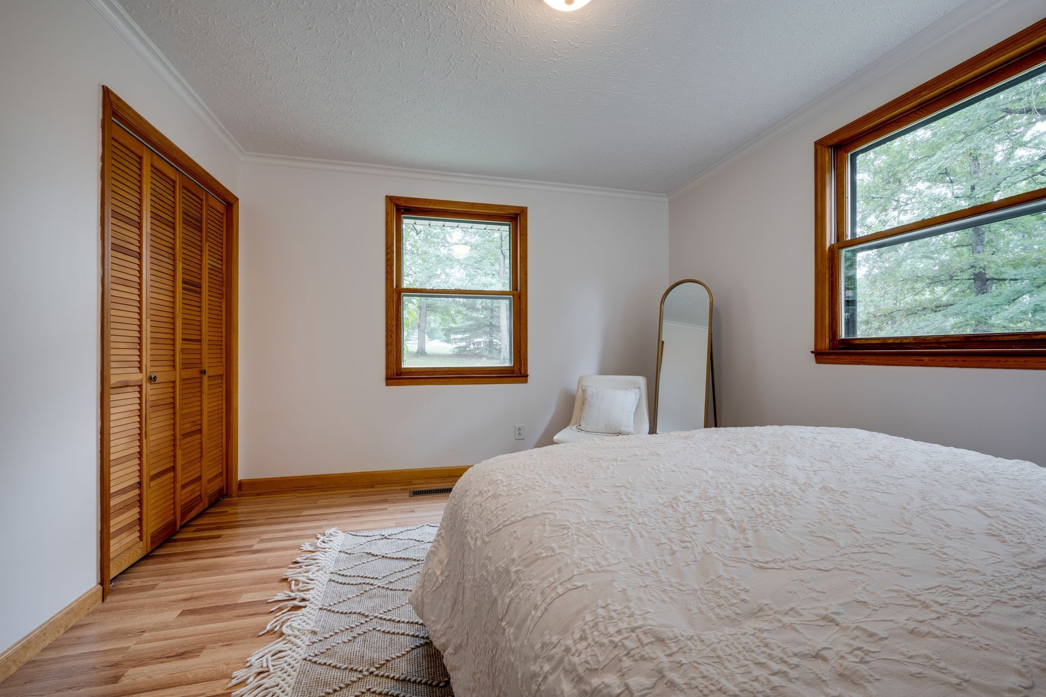 1085 Claylick Road White Bluff, TN 37187 - Photo 28 of 48 a bedroom with a bed and a large window