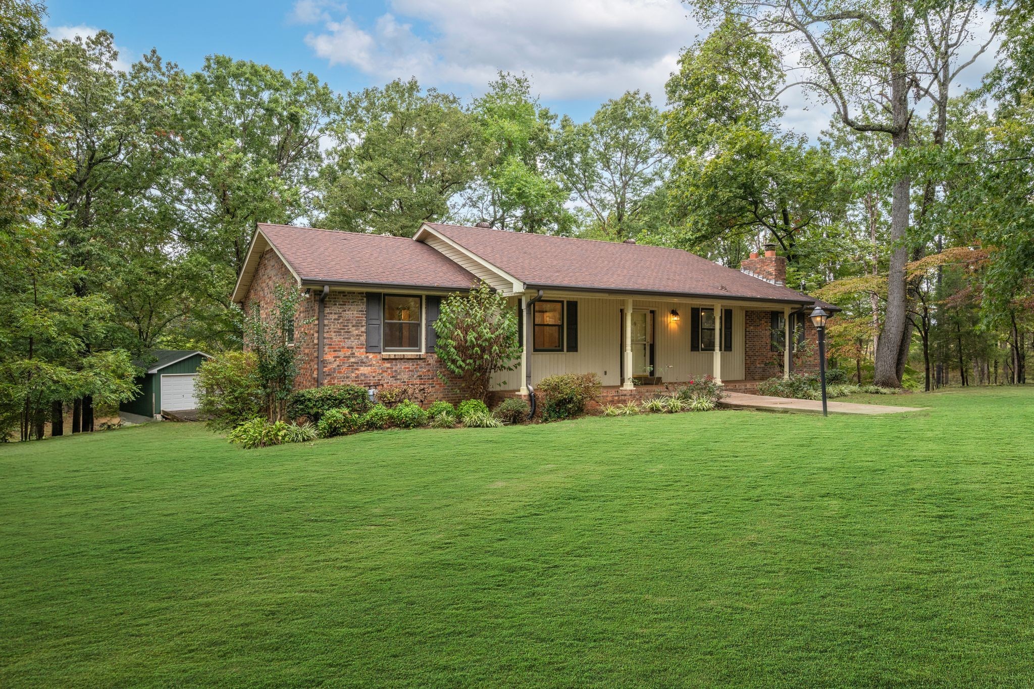 1085 Claylick Road White Bluff, TN 37187 - Photo 36 of 48 a front view of a house with a garden