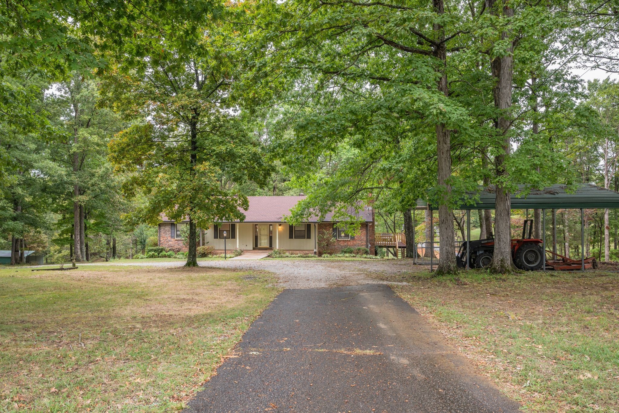 1085 Claylick Road White Bluff, TN 37187 - Photo 43 of 48 a front view of a house with a yard and trees