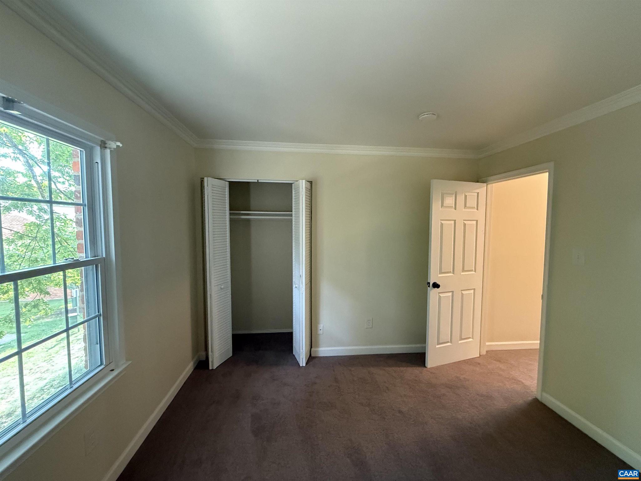 111 Hessian Hills Ridge, Unit 2 Charlottesville, VA 22901 - Photo 8 of 12 an empty room that has a window