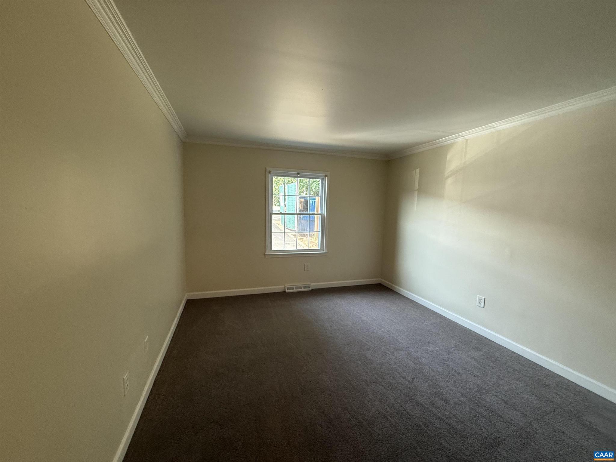 111 Hessian Hills Ridge, Unit 2 Charlottesville, VA 22901 - Photo 9 of 12 an empty room with a window