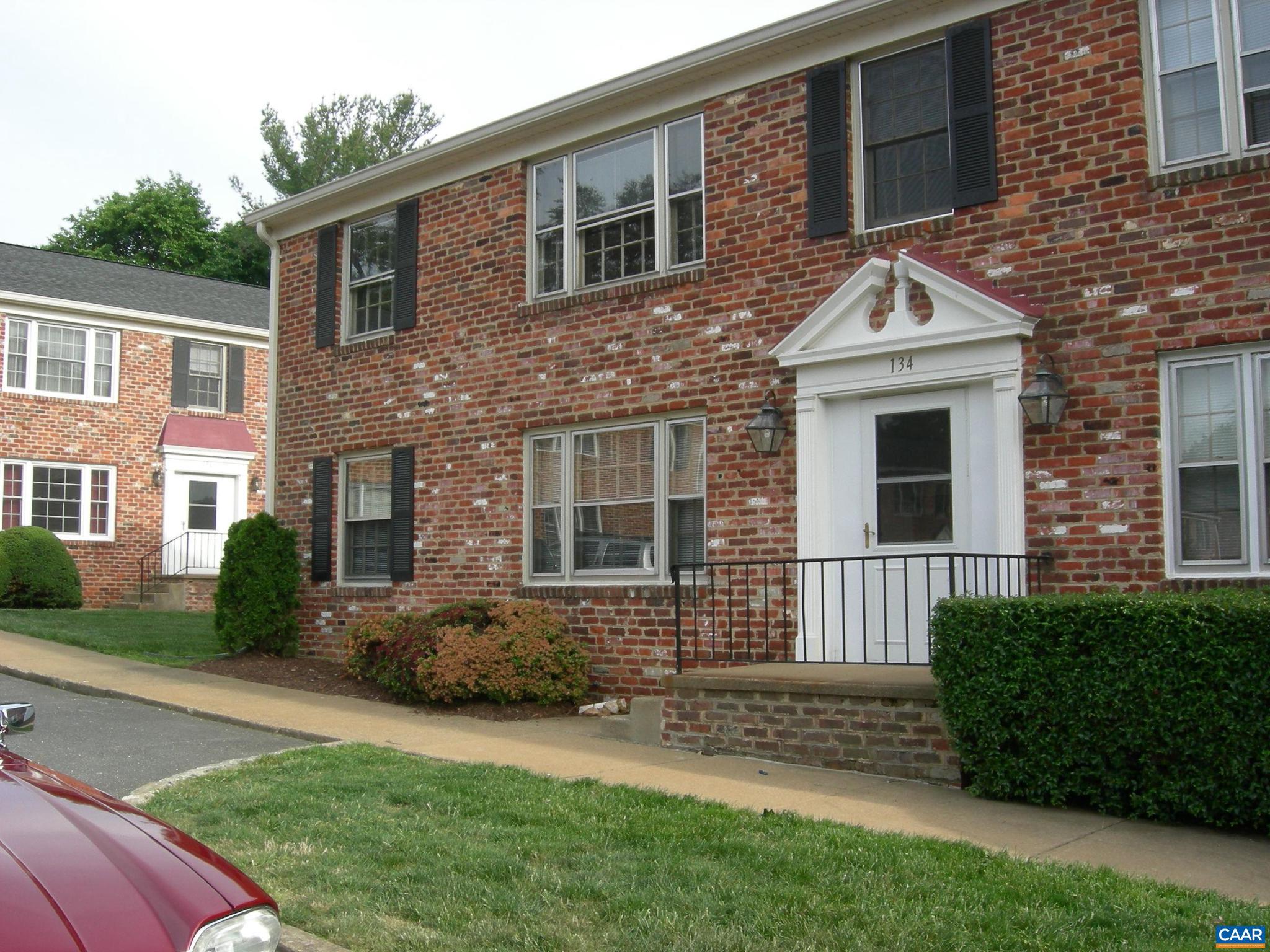 111 Hessian Hills Ridge, Unit 2 Charlottesville, VA 22901 - Photo 10 of 12 a front view of a house with a yard